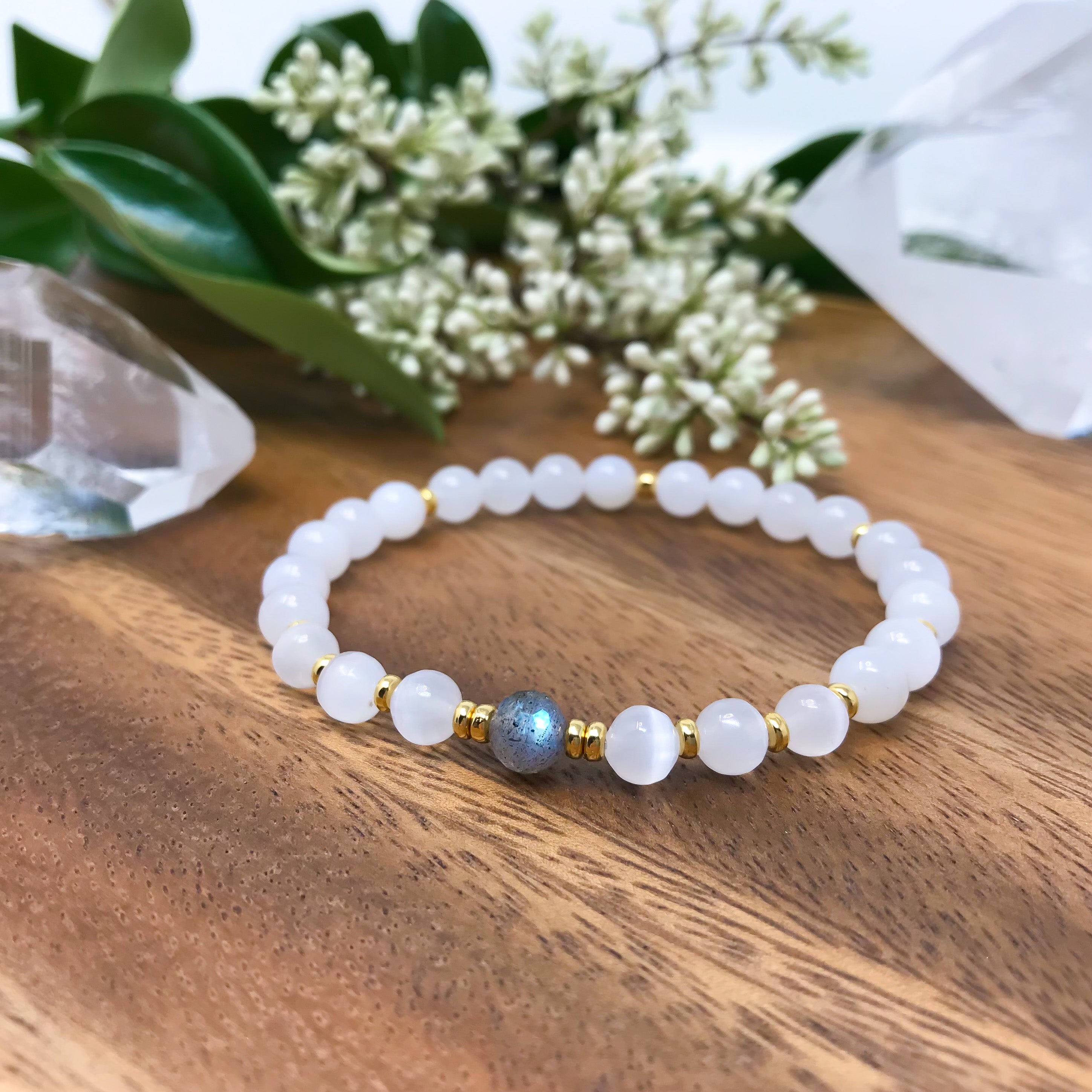 White Moonstone and Selenite yoga bracelet with a faceted Labradorite focal bead. Gold or sterling silver accents.