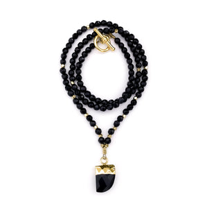 Faceted black onyx beaded necklace with black onyx pendant.