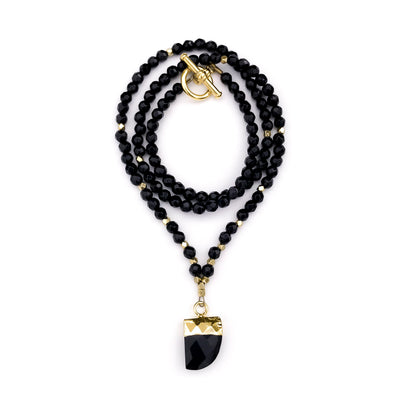 Faceted black onyx beaded necklace with black onyx pendant.