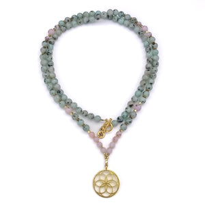 Mint green Sesame Jasper and pink opal 108 mala beads with flower or seed of life pendant for meditation and mantra repetitions.
