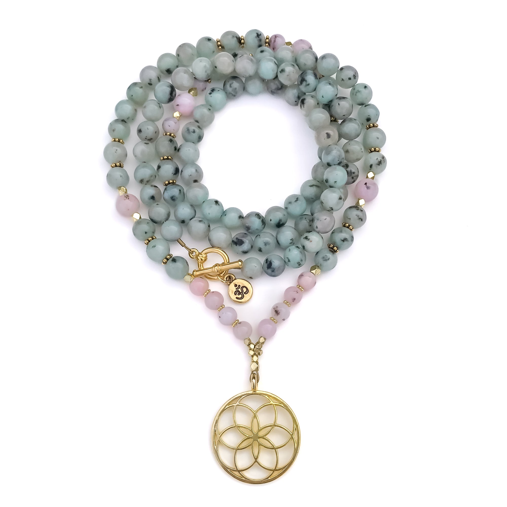 A beaded necklace with light blue-green and pale pink gemstone beads, accented with small gold spacer beads and a gold-tone flower motif pendant, displayed on a clean white background.