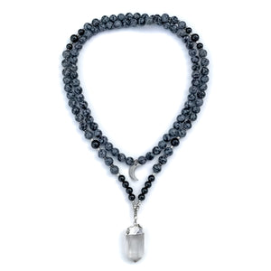 Natural Snowflake obsidian and black onyx 108 mala beads with clear quartz pendant, silver accents and crescent moon charm for meditation and manifestation.