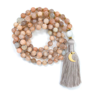 sunstone mala necklace knotted on gray silk with white moonstone guru bead, gray tassel and gold moon crescent charm