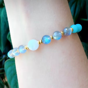 Aqua blue amazonite, grey labradorite and white moonstone mala bracelet with gold or silver accents.