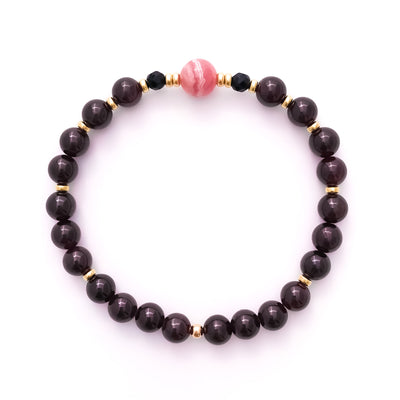 Natural crystal bracelet made with deep red Garnet, pink Rhodochrosite and Black Onyx beads and gold accents.