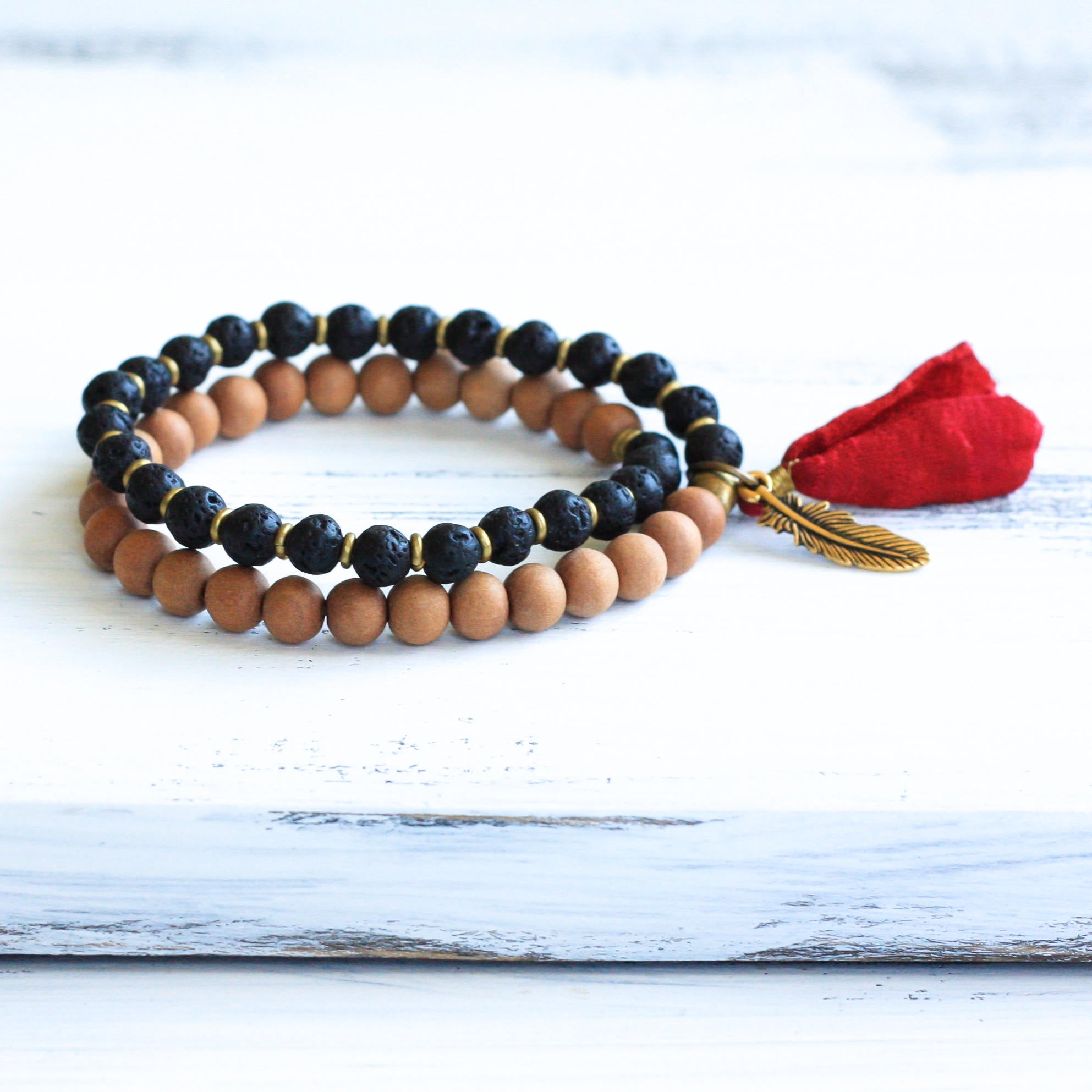Basalt Sandalwood mala prayer bead bracelet with tassel